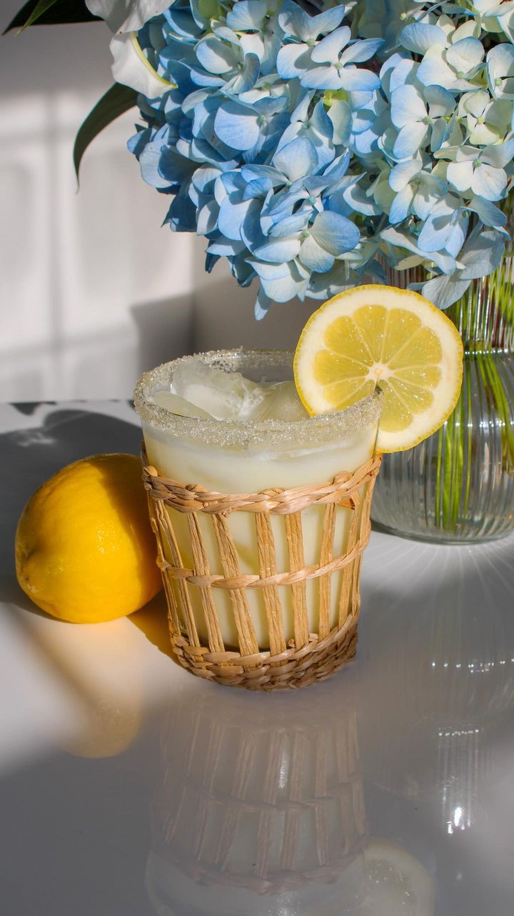 Lina's Limoncello Margarita over ice with a lemon wheel